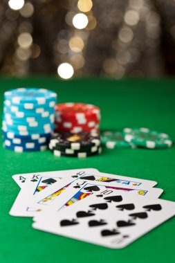 Live dealer at Singapore Pools table on bola365 login, showing Andar Bahar card layout and betting interface